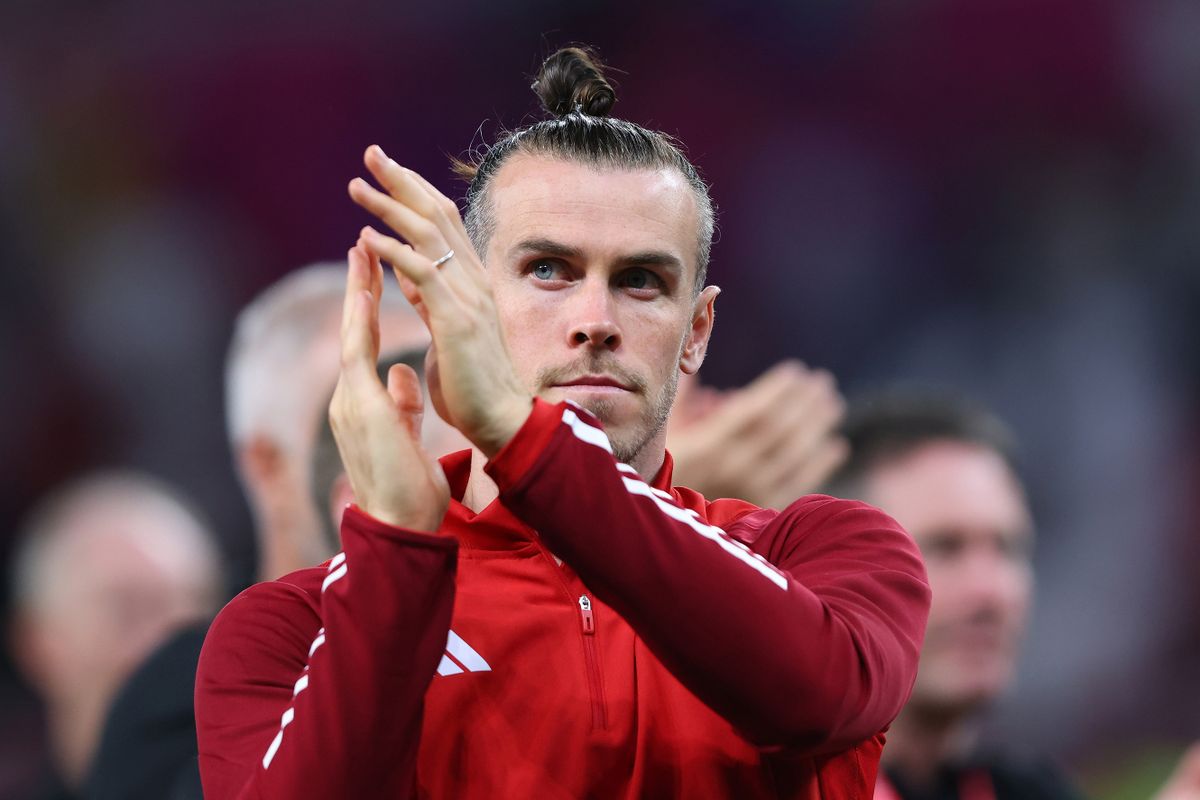 DOHA, QATAR - NOVEMBER 29:  Gareth Bale of Wales looks dejected as he applauds the fans during the FIFA World Cup Qatar 2022 Group B match between Wales and England at Ahmad Bin Ali Stadium on November 29, 2022 in Doha, Qatar. 