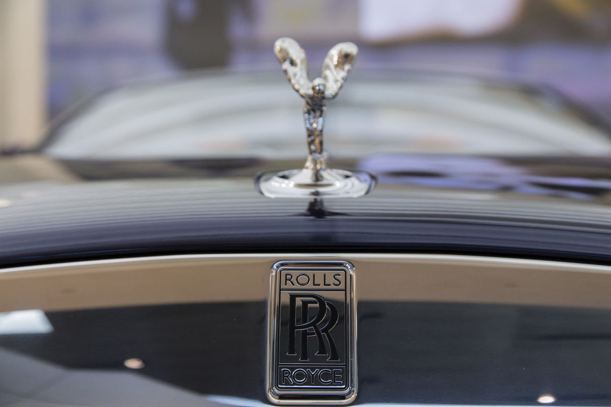 The Spirit of Ecstasy hood ornament sits on the hood of a Rolls-Royce Dawn automobile, produced by Rolls-Royce Motor Cars Ltd., the ultra-luxury brand of Bayerische Motoren Werke AG (BMW), sits on display inside the BMW World showroom in Munich, Germany, on Tuesday, Jan. 26, 2016. BMW is at risk of losing its lead in the luxury car market this year to Mercedes-Benz after reporting the slowest sales growth since 2009 while its German arch-rival charged ahead with a fresher lineup and surging demand in China. 