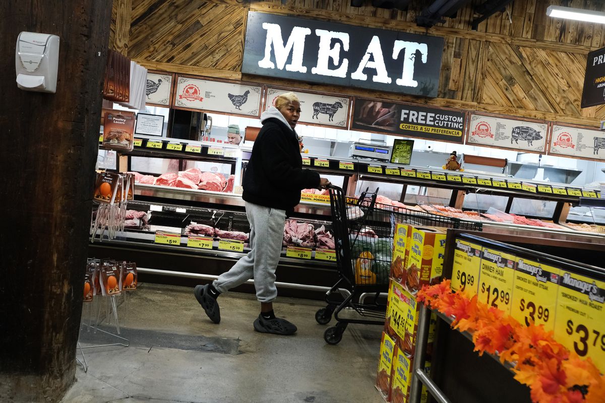 NEW YORK, NEW YORK - NOVEMBER 14:  A person walks past the meal aisle inside a grocery store on November 14, 2022 in New York City. The price of turkeys, a staple for many Americans at Thanksgiving, is at record highs this year due to inflation and a rise in the price of feed among other cost issues.  