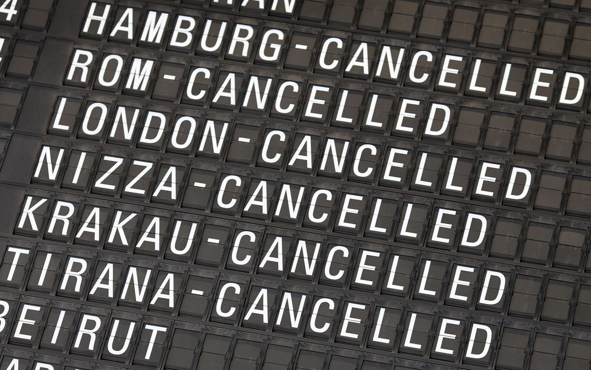 A display indicates cancelled flights at Frankfurt Airport in Frankfurt am Main, western Germany, on July 27, 2022, after employees of German airline Lufthansa were called to strike. - German national carrier Lufthansa said on July 26 it would have to cancel almost all flights at its domestic hubs in Frankfurt and Munich because of a planned strike by ground crew, adding to a summer of travel chaos across Europe. 