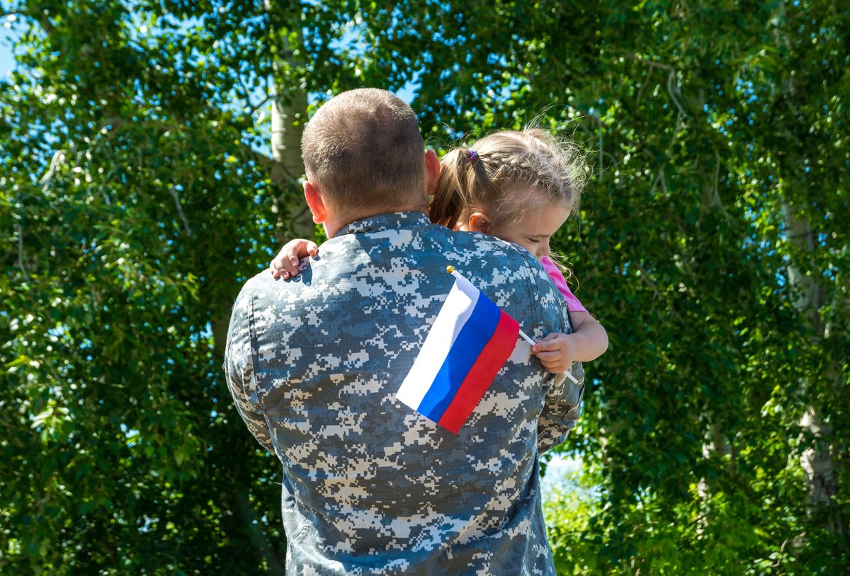 Happy,Reunion,Of,Soldier,From,Russia,With,Family,,Daughter,Hug