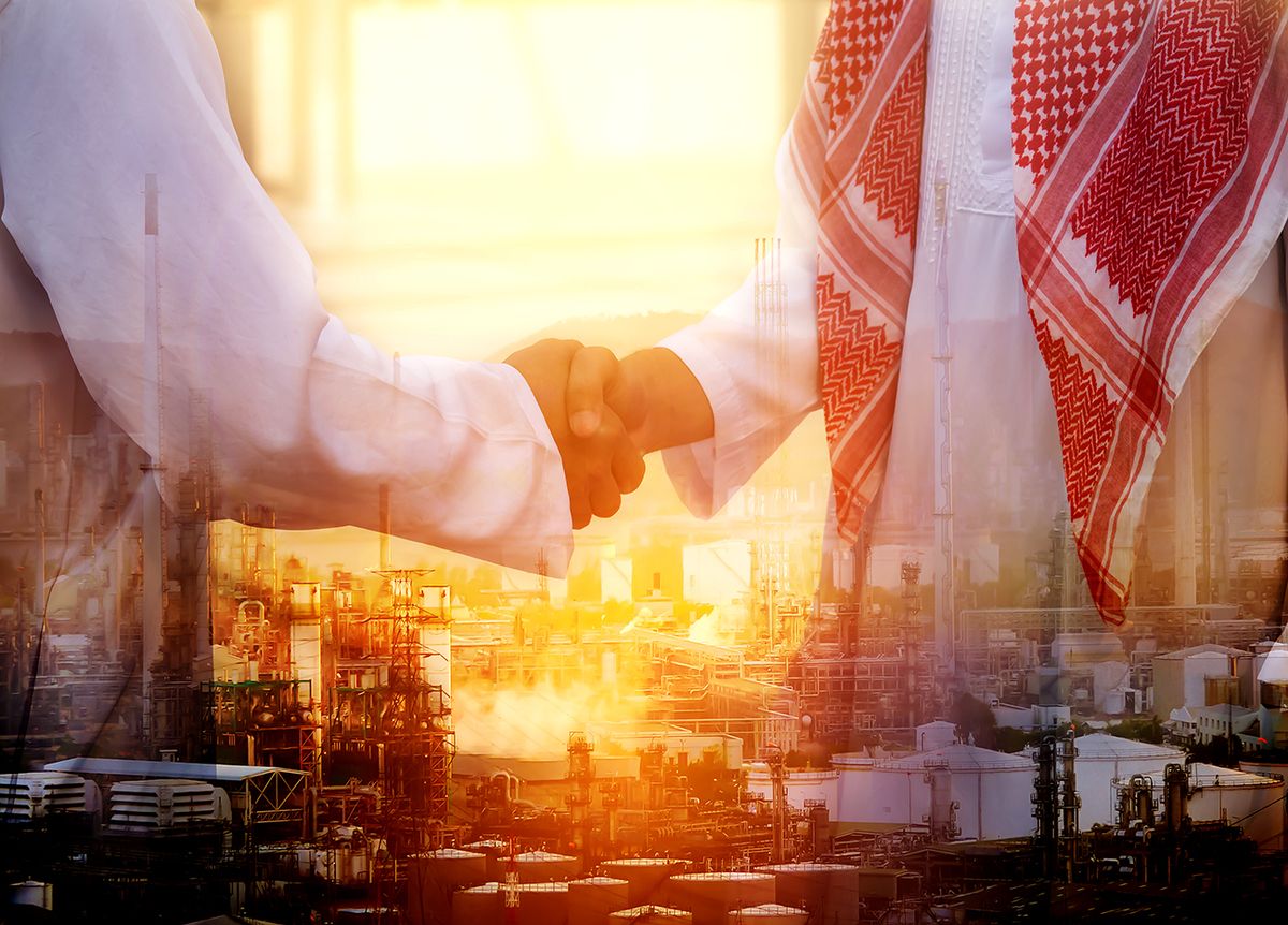 Double,Exposure,Of,Business,Handsome,Arab,Man,Hand,Shake,And Double exposure of business handsome Arab man hand shake and Oil refinery background