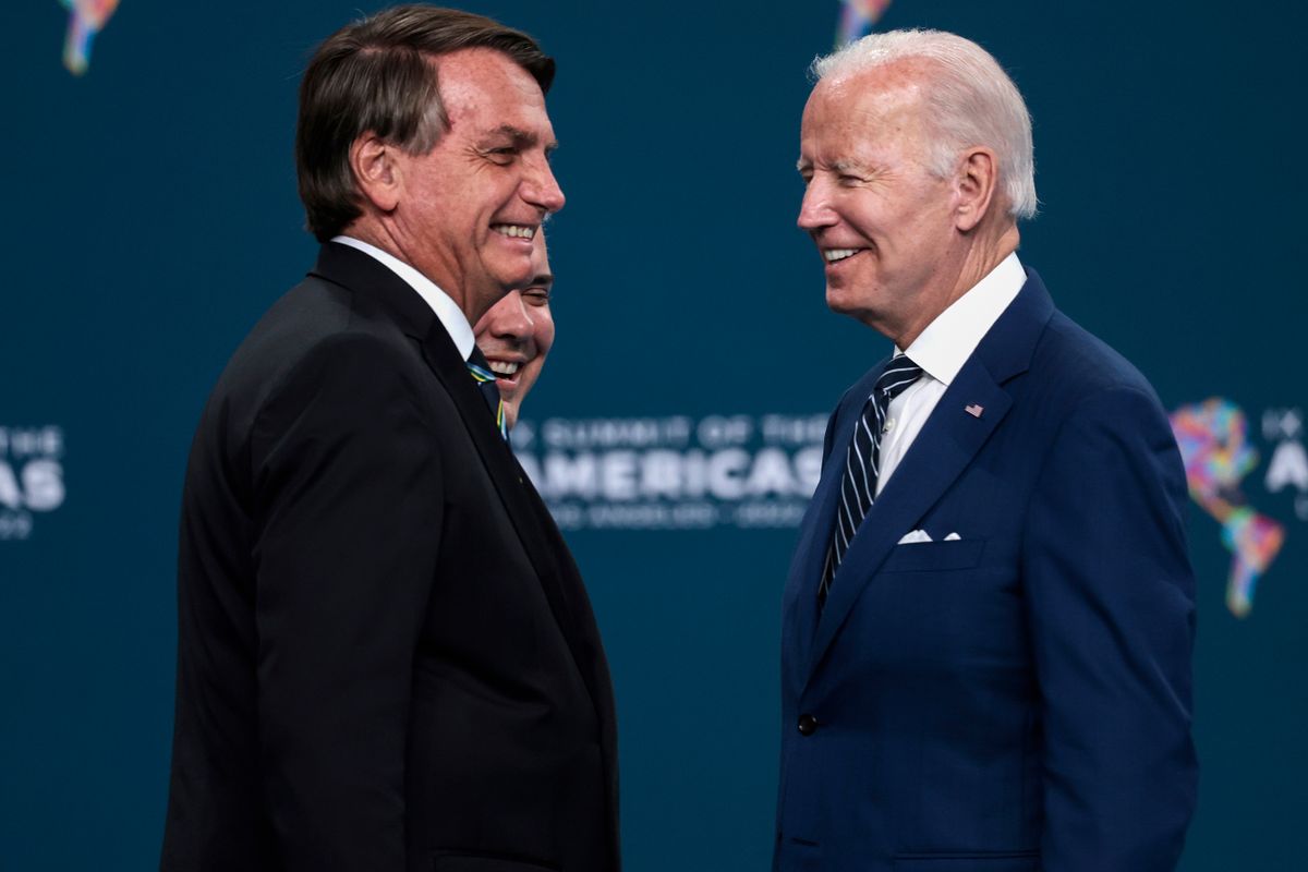 LOS ANGELES, CALIFORNIA - JUNE 10: U.S. President Joe Biden speaks to President Jair Bolsonaro of Brazil after a group photo with leaders of the IX Summit of the Americas at the LA Convention Center on June 10, 2022 in Los Angeles, California. For the past few days leaders from North and South America have held meetings at the summit to discuss issues such as trade and migration. The United States hosted the summit for the first time since 1994, when it took place in Miami. 