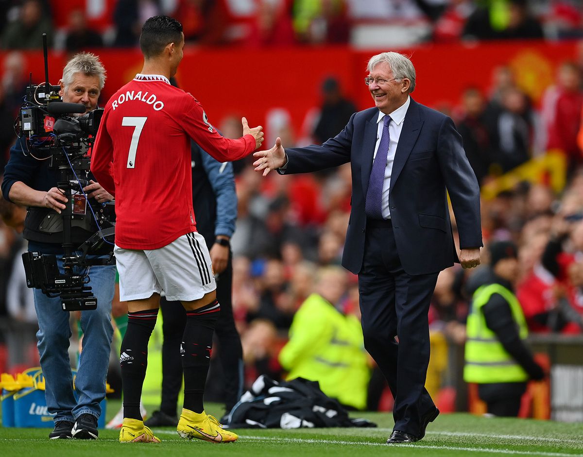 Manchester United v Newcastle United - Premier League MANCHESTER, ENGLAND - OCTOBER 16: Cristiano Ronaldo of Manchester United and Sir Alex Ferguson shake hands prior to the Premier League match between Manchester United and Newcastle United at Old Trafford on October 16, 2022 in Manchester, England. (Photo by Dan Mullan/Getty Images)