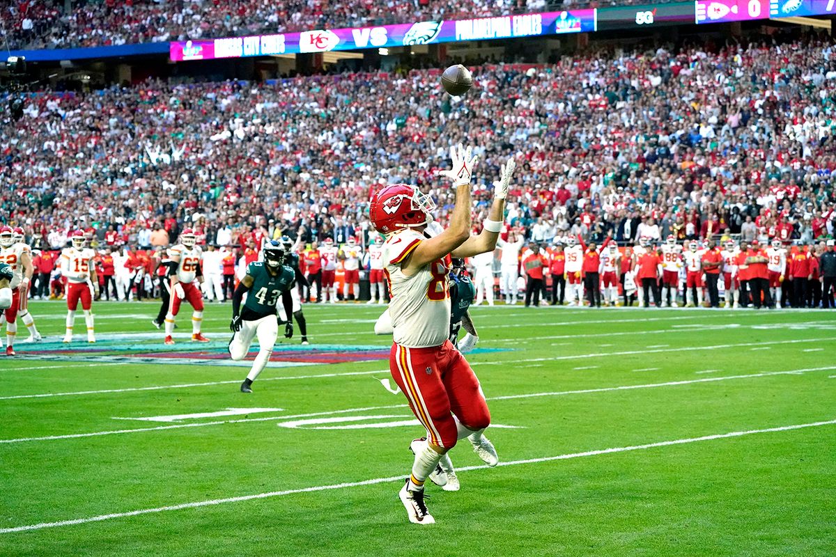 Super Bowl LVII - Kansas City Chiefs v Philadelphia Eagles
Kansas City Chiefs' tight end Travis Kelce catches the ball and runs to score a touchdown during Super Bowl LVII between the Kansas City Chiefs and the Philadelphia Eagles at State Farm Stadium in Glendale, Arizona, on February 12, 2023. (Photo by Timothy A. CLARY / AFP)