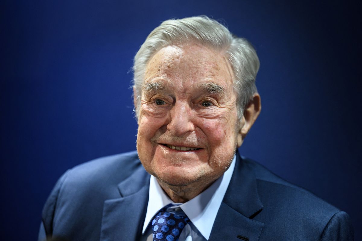 Hungarian-born US investor and philanthropist George Soros smiles after delivering a speech on the sidelines of the World Economic Forum (WEF) annual meeting in Davos on May 24, 2022. (Photo by Fabrice COFFRINI / AFP)