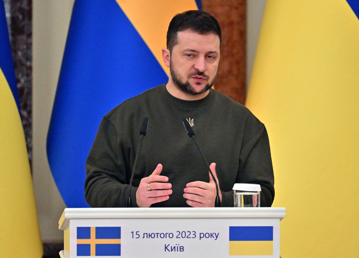 Ukrainian President Volodymyr Zelensky gestures as he speaks to media during their joint press conference with Prime Minister of Sweden following the talks in Kyiv on February 15, 2023.