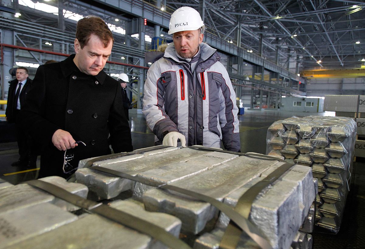- Russia's President Dmitry Medvedev (L) listens to CEO of Russian metals giant UC Rusal Oleg Deripaska (R) as he visits Rusal aluminium smelter in Sayanogorsk, in Russia's Eastern Siberian province of Khakassia, on March 11, 2011.   AFP PHOTO/ RIA-NOVOSTI/ KREMLIN POOL/ DMITRY ASTAKHOV (Photo by DMITRY ASTAKHOV / KREMLIN POOL / AFP)