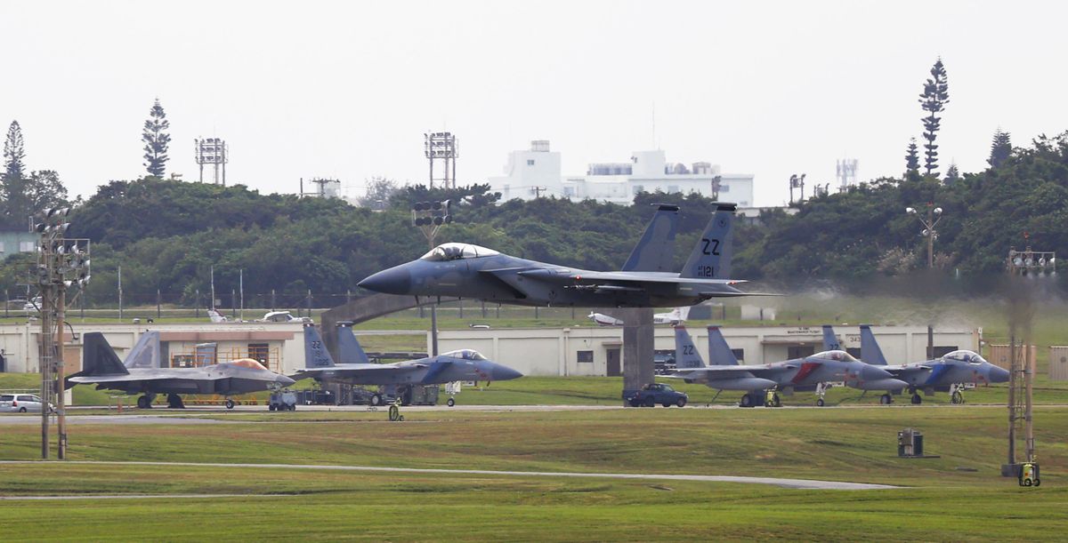 File photo taken on Dec. 14, 2022, shows an F-15 fighter (C) at the U.S. Air Force's Kadena base in Okinawa Prefecture, southern Japan.