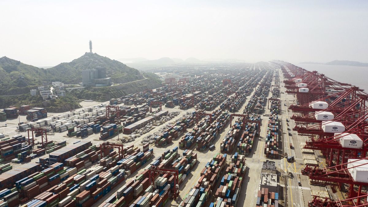 Gantry cranes and containers at the Yangshan Deepwater Port in Shanghai, China, on Tuesday, July 5, 2022. Senior US and Chinese officials discussed US economic sanctions and tariffs Tuesday amid reports the Biden administration is close to rolling back some of the trade levies imposed by former President Donald Trump. 