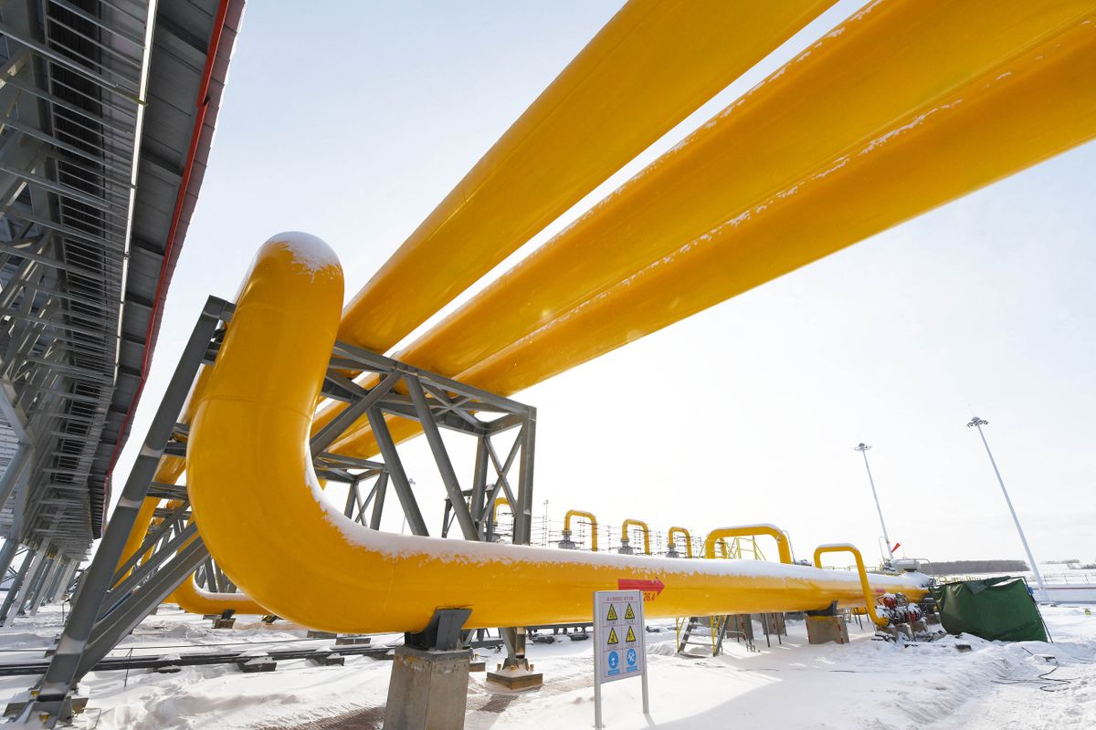 (191202) -- HEIHE, Dec. 2, 2019 (Xinhua) -- Photo taken on Nov. 19, 2019 shows the gas-distributing and compressing station of the China-Russia east-route natural gas pipeline in the city of Heihe, the first stop after the Russia-supplied natural gas enters China, northeast China's Heilongjiang Province. The China-Russia east-route natural gas pipeline was put into operation on Monday. The pipeline is scheduled to provide China with 5 billion cubic meters of Russian gas in 2020 and the amount is expected to increase to 38 billion cubic meters annually from 2024, under a 30-year contract worth 400 billion U.S. dollars signed between the China National Petroleum Corp (CNPC) and Russian gas giant Gazprom in May 2014.  The cross-border gas pipeline has a 3,000-km section in Russia and a 5,111-km stretch in China.