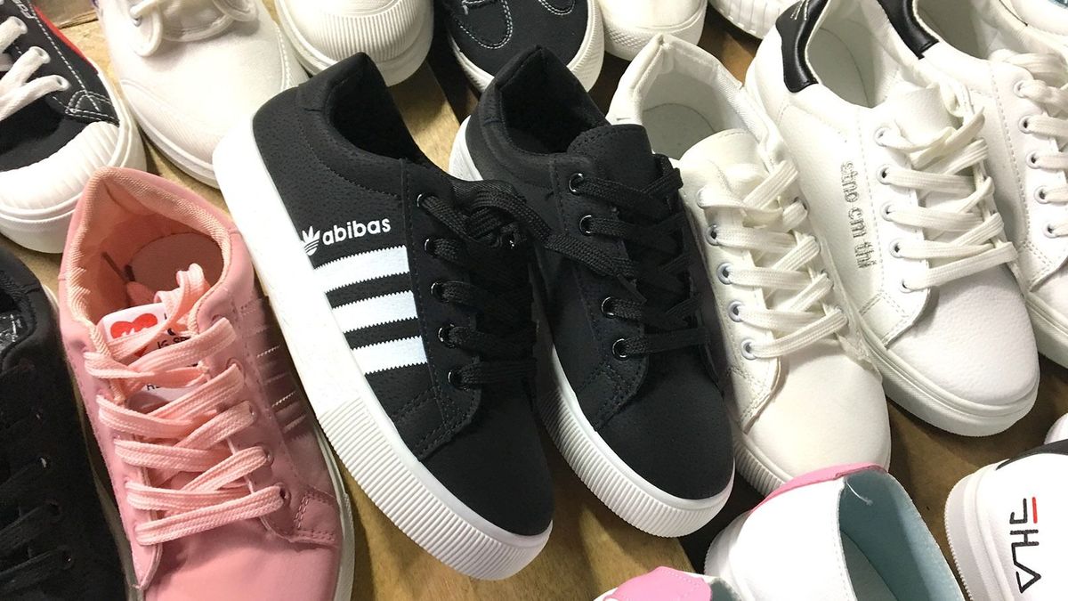 Nanning,,China,-,Circa,November,2018,:,“adidas”,Look,Alike
NANNING, CHINA - CIRCA NOVEMBER 2018 : “ADIDAS” LOOK ALIKE shoes sold at the store.