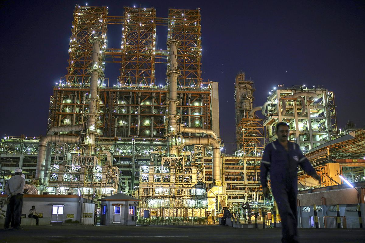 Operations at the Vadinar Refinery Operated By Nayara Energy, Formerly Essar Oil
The Vadinar Refinery complex operated by Nayare Energy Ltd., formerly known as Essar Oil Ltd. and now jointly owned by Rosneft Oil Co. and Trafigura Group Pte., stands illuminated at night near Vadinar, Gujarat, India, on Thursday, April 26, 2018. The refinery was the crown jewel in a blockbuster $13 billion acquisition that, at the time, represented the largest foreign direct investment in India's history. The deal marked Trafigura's coming of age. Photographer: Dhiraj Singh/Bloomberg via Getty Images