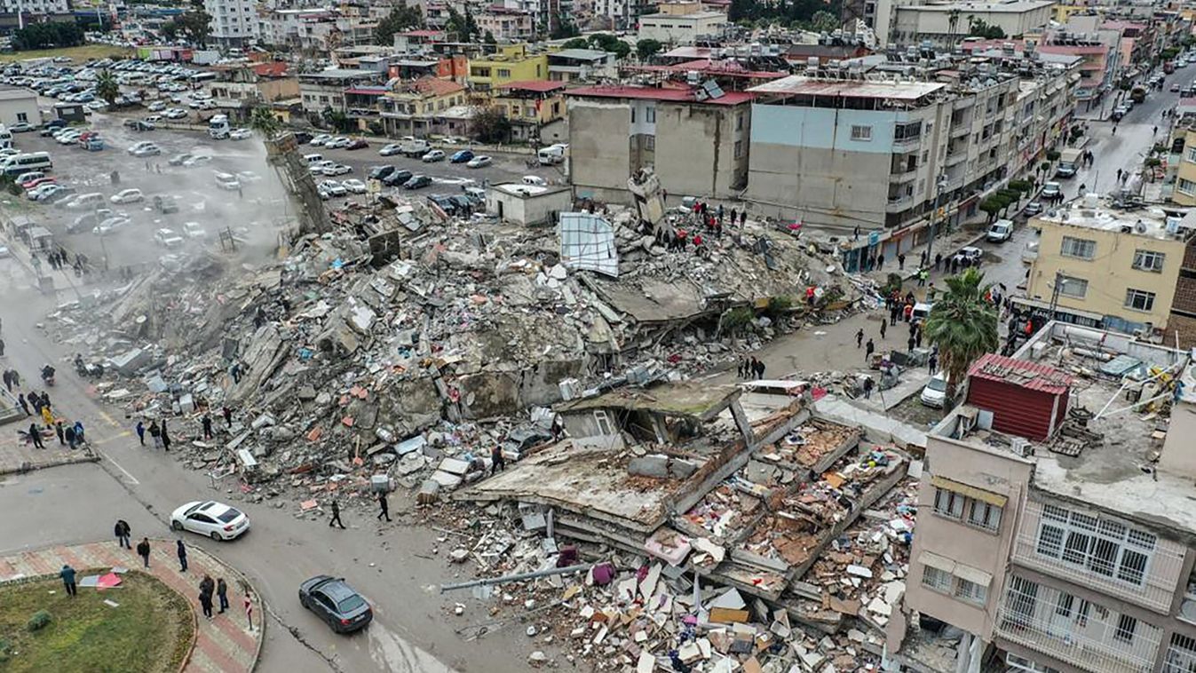 HATAY, TURKIYE - FEBRUARY 06: An aerial view of debris of a collapsed building after 7.7 magnitude earthquake hits Hatay, Turkiye on February 06, 2023. Disaster and Emergency Management Authority (AFAD) of Turkiye said the 7.7 magnitude quake struck at 4.17 a.m. (0117GMT) and was centered in the Pazarcik district in Turkiye’s southern province of Kahramanmaras. Gaziantep, Sanliurfa, Diyarbakir, Adana, Adiyaman, Malatya, Osmaniye, Hatay, and Kilis provinces are heavily affected by the quake. Murat Sengul / Anadolu Agency 