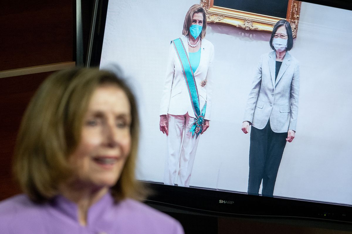 An image of US Speaker of the House Nancy Pelosi (D-CA) meeting with Taiwan's President Tsai Ing-wen during her stop in Taiwan is displayed as Speaker Pelosi speaks during a press conference on Capitol Hill in Washington, DC, on August 10, 2022