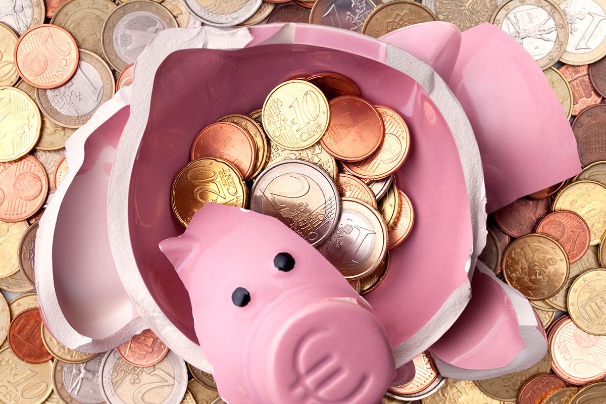 Savings. Broken piggy bank with euro coins Savings. Broken piggy bank with euro coins. megtakarítás, euró, save money