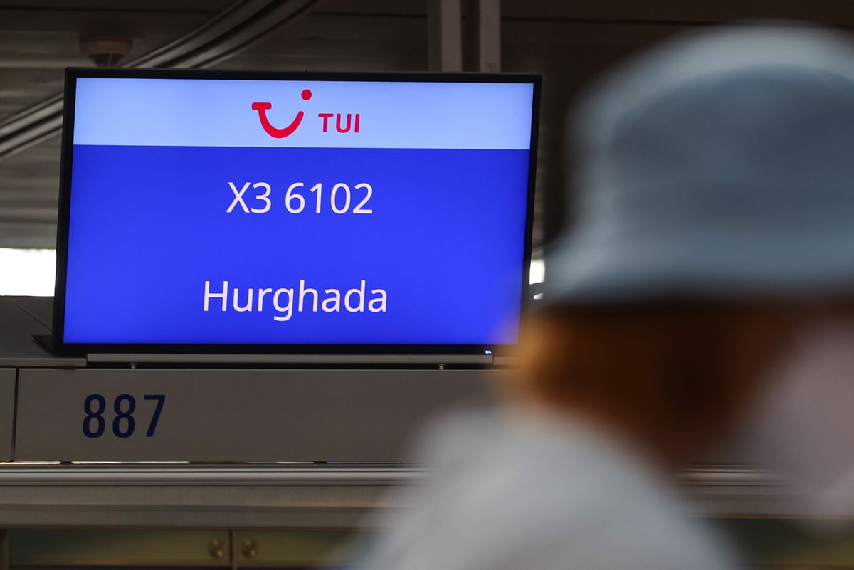 A screen shows flight destination information for Hurghada, Egypt, at the TUI AG flight check-in desks at Frankfurt Airport in Frankfurt, Germany, on Tuesday, July 6, 2021. TUI has raised billions of euros from three bailouts since the coronavirus pandemic punctured its business ferrying north Europeans to warm-weather destinations in the Mediterranean 