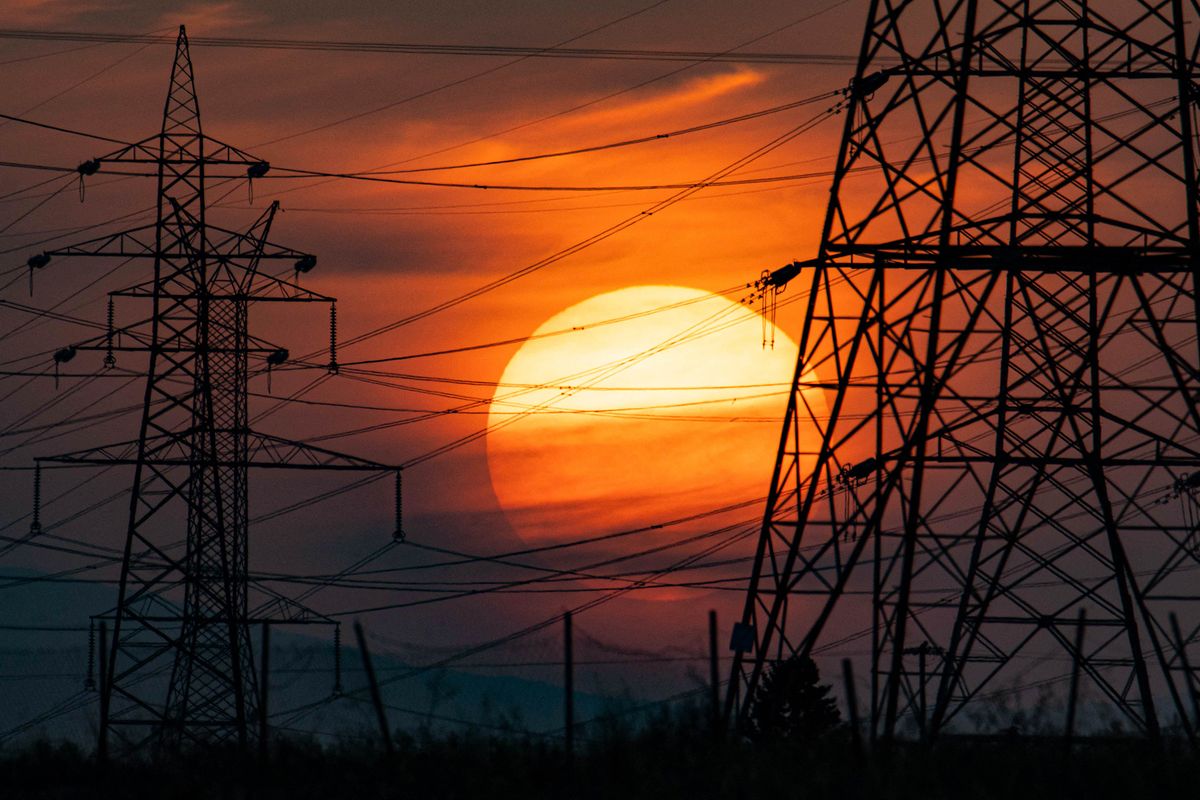 High Voltage Pylons During Sunset Time