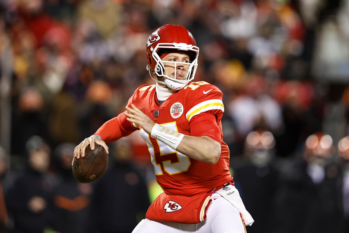 KANSAS CITY, MISSOURI - JANUARY 29: Patrick Mahomes #15 of the Kansas City Chiefs passes the ball during the AFC Championship NFL football game between the Kansas City Chiefs and the Cincinnati Bengals at GEHA Field at Arrowhead Stadium on January 29, 2023 in Kansas City, Missouri. (Photo by Michael Owens/Getty Images)