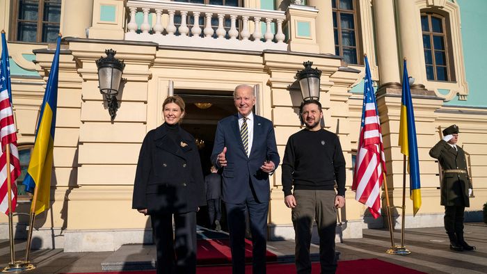 President Joe Biden (C) reacts as he poses for a photograph with Ukrainian President Volodymyr Zelensky and his wife Olena Zelenska, upon his arrival at the Mariinsky Palace in Kyiv on February 20, 2023. - US President Joe Biden promised increased arms deliveries for Ukraine during a surprise visit to Kyiv on February 20, 2023, in which he also vowed Washington's "unflagging commitment" in defending Ukraine's territorial integrity.