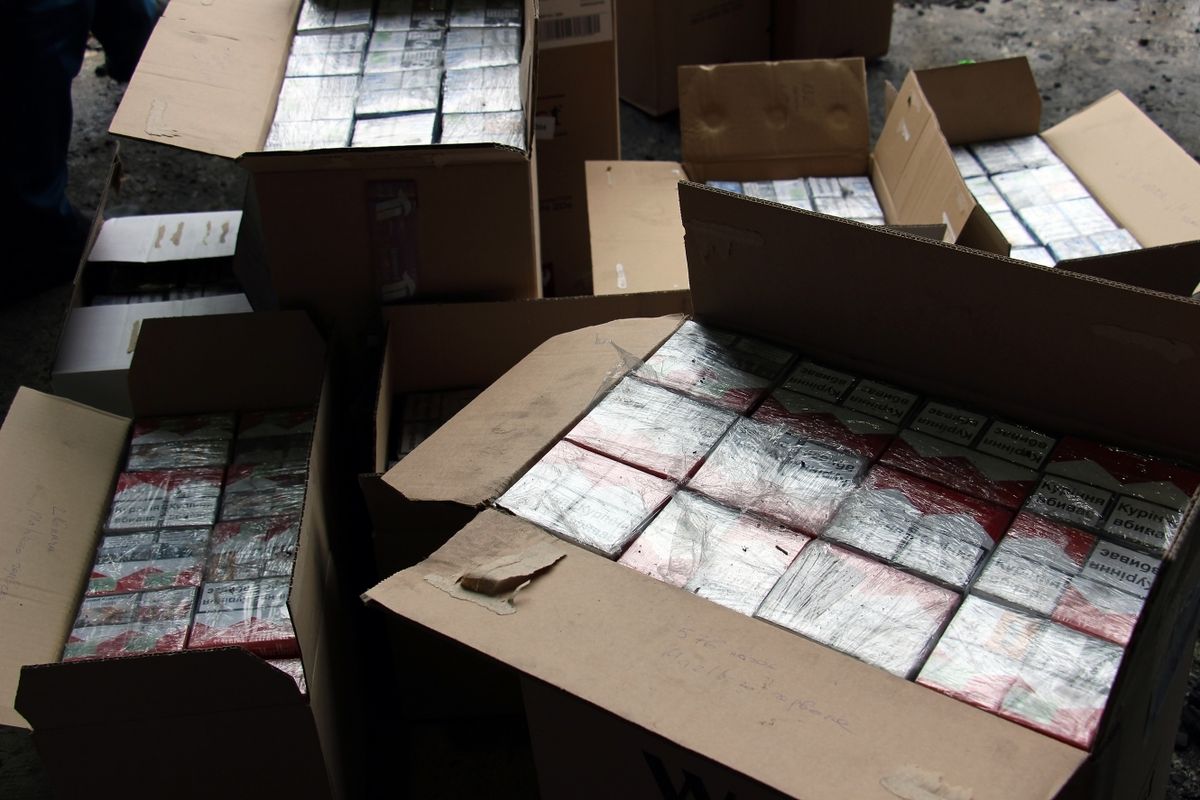SHEGINI, UKRAINE - MARCH, 2017: Smuggled cigarettes disguised as peat briquettes were found in a truck heading through the "Shegini-Medyka" checkpoint from Ukraine to Poland, 80 kilometers of Lviv