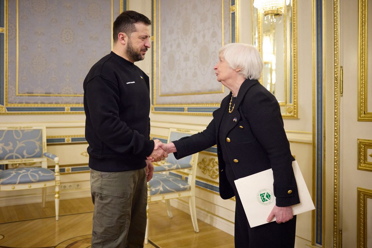 This handout picture taken and released by Ukrainian Presidential press-service on February 27, 2023 shows Ukrainian President Volodymyr Zelensky (L) welcoming US Secretary of the Treasury Janet Yellen before talks in Kyiv, amid the Russian invasion of Ukraine. 