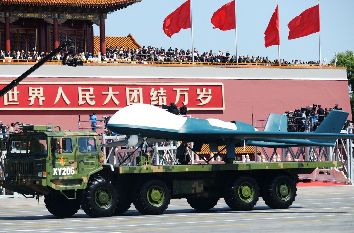 China holds massive military parade, to cut troop levels by 300,000