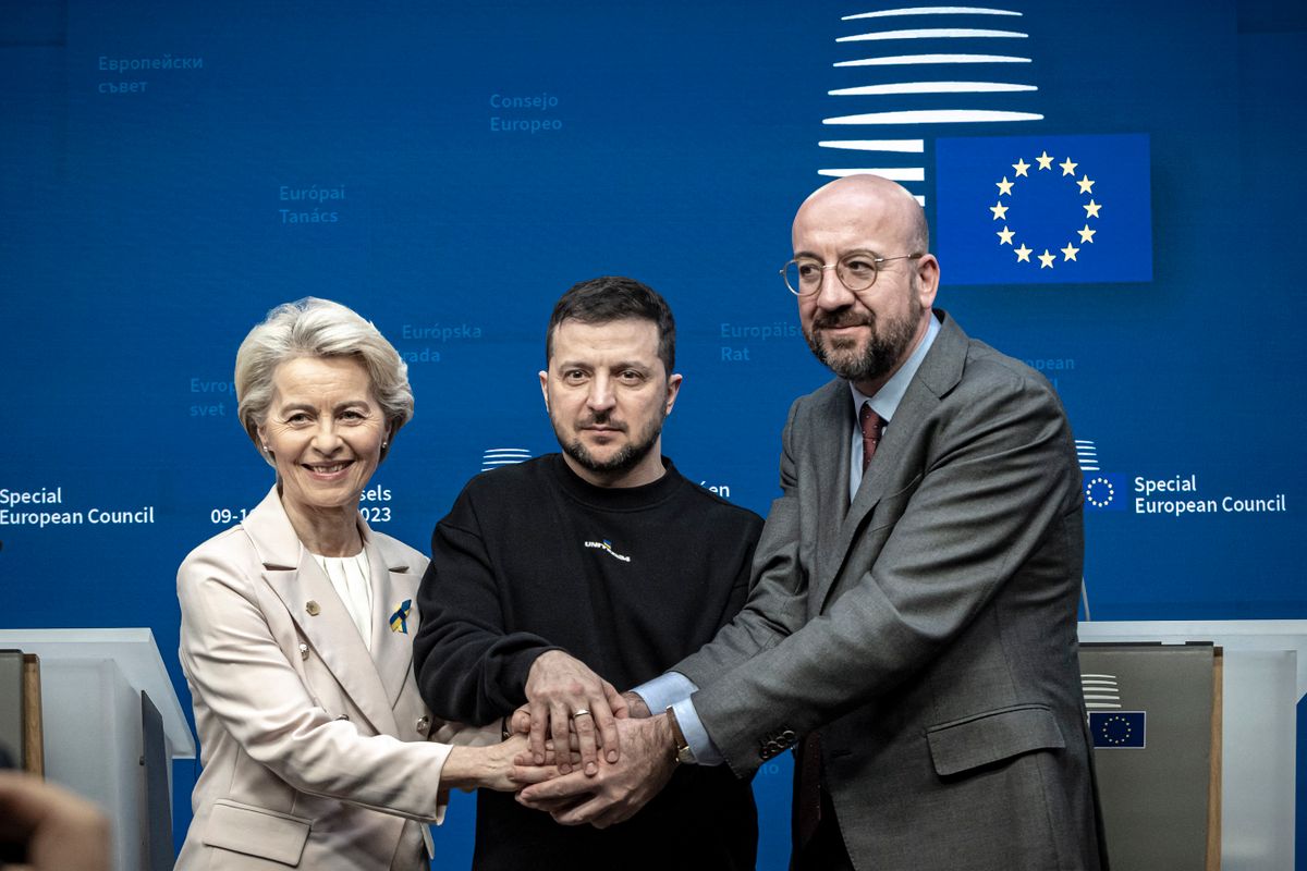 Volodymyr Oleksandrovych Zelenskyy the President of Ukraine (C) as seen with Charles Michel president of the EUCO (R) and Ursula von der Leyen President of the European Commission (L) united holding their hands together and smiling following the end of the joint press conference with statements, talking and answering questions from journalists from international media, after the meeting with the European Leaders heads of states. All three of them chanted ''Slava Ukraini'' translated as Glory to Ukraine, the national Ukrainian salute known as symbol of Ukrainian sovereignty and resistance to foreign aggression. Ukrainian President Zelenskiy attends the EU Leaders Summit, the European Council at the headquarters in Brussels. Zelensky pleads to the allies to deliver combat fighter jet planes to Ukraine. His presence in Brussels was followed after a short trip in London and Paris. Brussels,  Belgium on February 9, 2023 (Photo by Nicolas Economou/NurPhoto) 