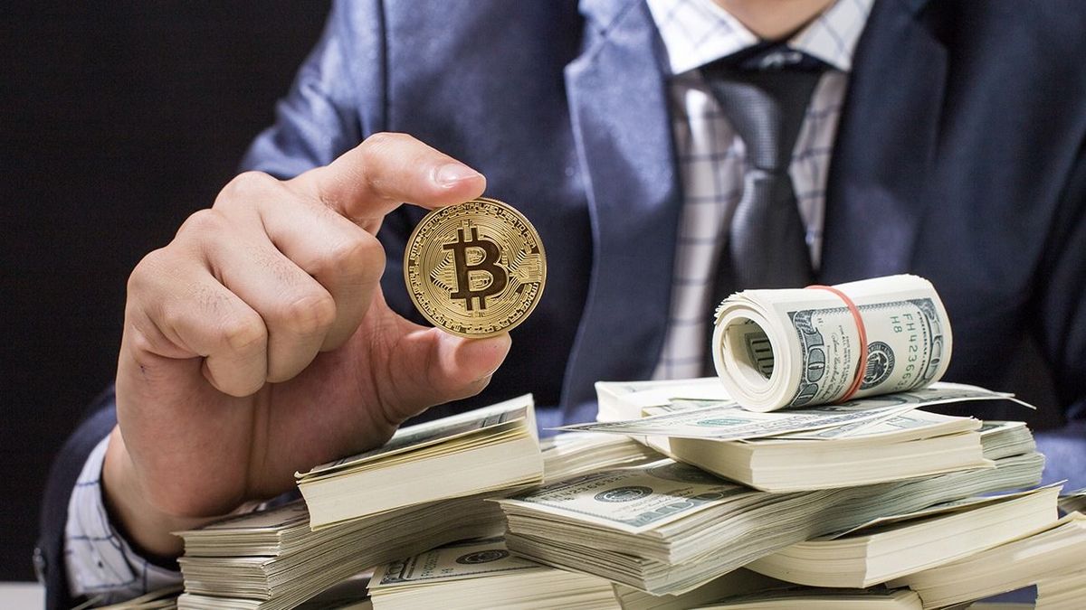 Businessman,Receive,A,Lot,Of,Money,From,Smartphone,,Businessman,Holding Businessman receive a lot of Money from Smartphone, Businessman Holding Bitcoin Isolated on black background, Digital Money and Bitcoine Concept.