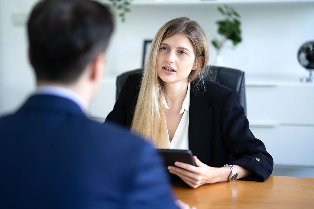 Human resources woman manager  interview a candidate applying for a job in office room Human resources woman manager  interview a candidate applying for a job in office room