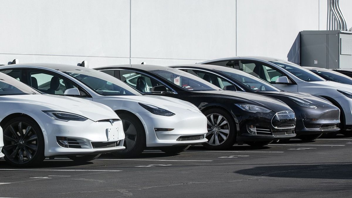 Las Vegas, NV, USA 2-13-2021: A row of new 2021 Teslas in panoramic view. The range includes Model S, X, 3, and Y. Captured at the Tesla of Las Vegas dealership on W Sahara Avenue.