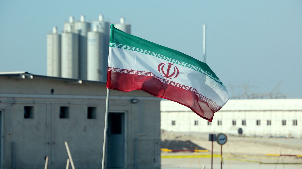 A picture taken on November 10, 2019, shows an Iranian flag in Iran's Bushehr nuclear power plant, during an official ceremony to kick-start works on a second reactor at the facility. - Bushehr is Iran's only nuclear power station and is currently running on imported fuel from Russia that is closely monitored by the UN's International Atomic Energy Agency. 