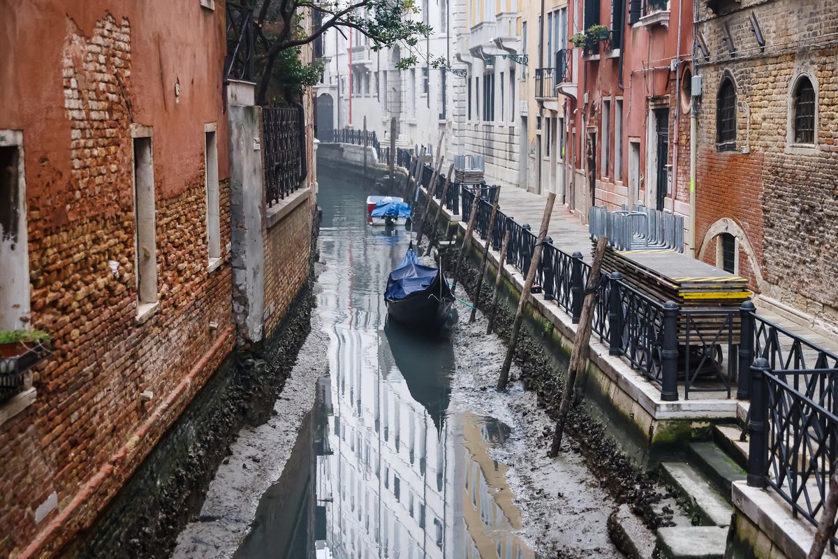A general view of a dry canal for low tide on February 16, 2023 in Venice, Italy 