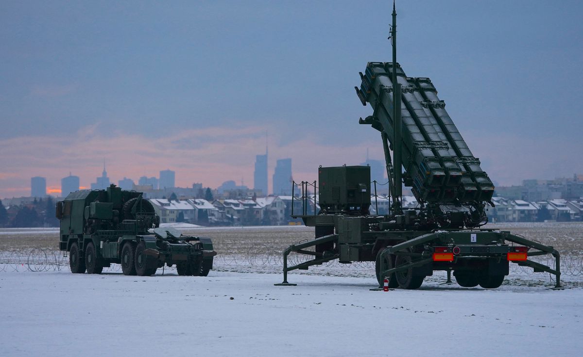 A PATRIOT (Phased Array Tracking Radar to Intercept on Target) surface-to-air missile system is pictured during a military exercise at Warsaw Babice Airport, Poland on February 7, 2023. - Patriot missile systems purchased by Poland last year have been redeployed to the Polish captital for military exercises.
