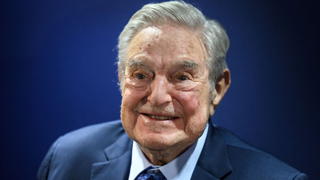 Hungarian-born US investor and philanthropist George Soros smiles after delivering a speech on the sidelines of the World Economic Forum (WEF) annual meeting in Davos on May 24, 2022. (Photo by Fabrice COFFRINI / AFP)