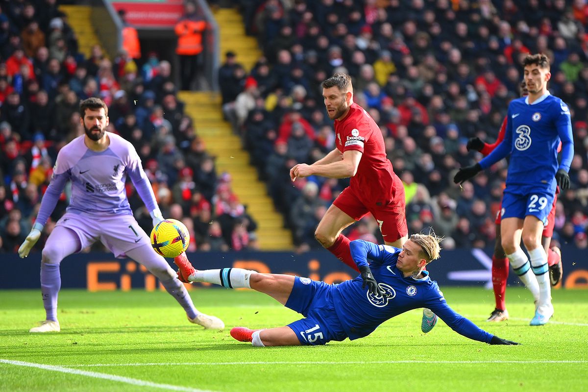 Liverpool FC v Chelsea FC - Premier League
LIVERPOOL, ENGLAND - JANUARY 21: Mykhailo Mudryk of Chelsea slides fro the ball from James Milner of Liverpool during the Premier League match between Liverpool FC and Chelsea FC at Anfield on January 21, 2023 in Liverpool, England. (Photo by Laurence Griffiths/Getty Images)