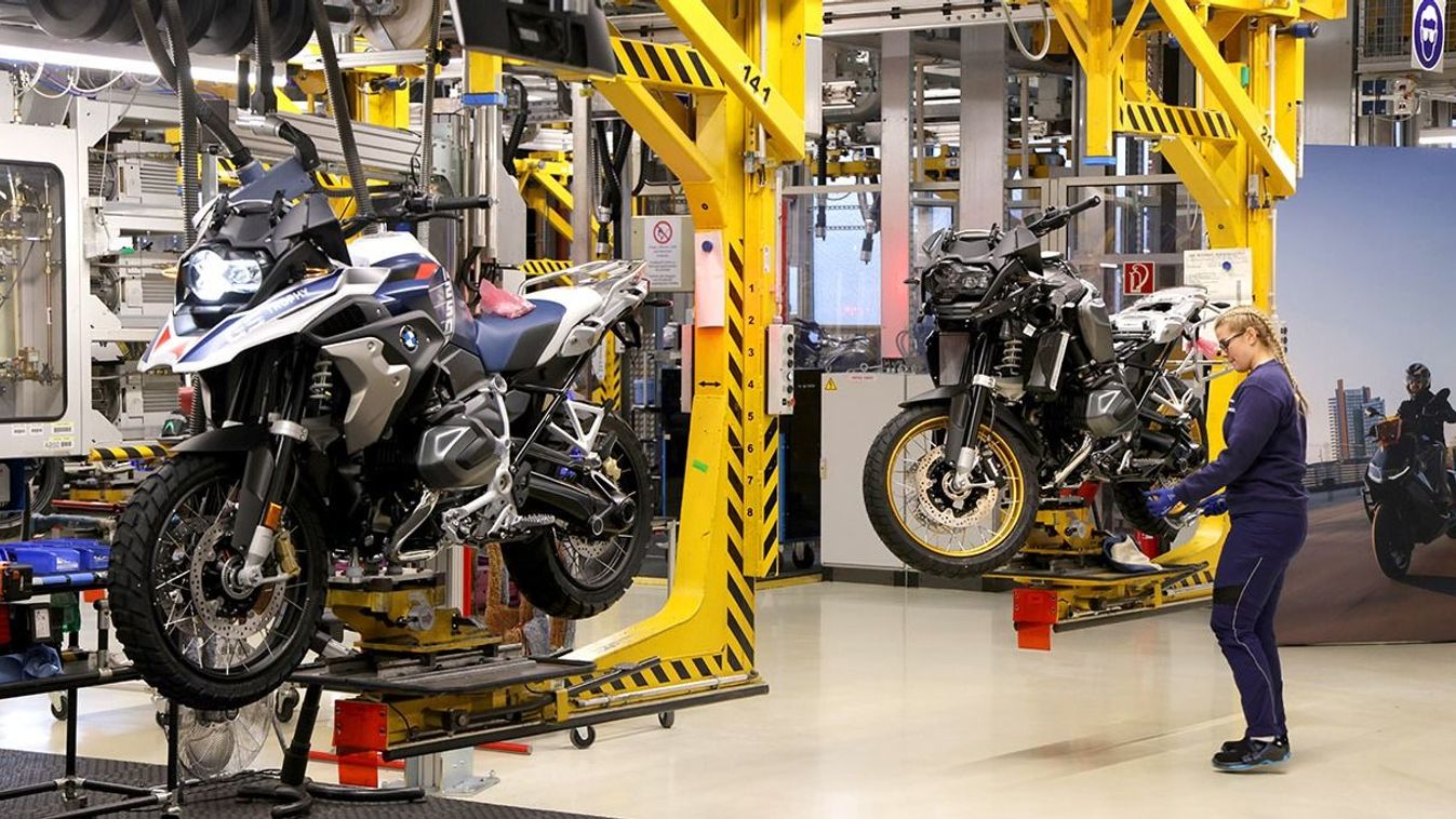 Scholz Visits BMW Motorcycle Factory
BERLIN, GERMANY - DECEMBER 19: A female trainee works on the assembly line at the BMW motorcycle manufacturing plant on December 19, 2022 in Berlin, Germany. The plant, opened in 1967, produces over 550 gasoline and electric powered motorcycles and scooters per day.  (Photo by Sean Gallup/Getty Images)