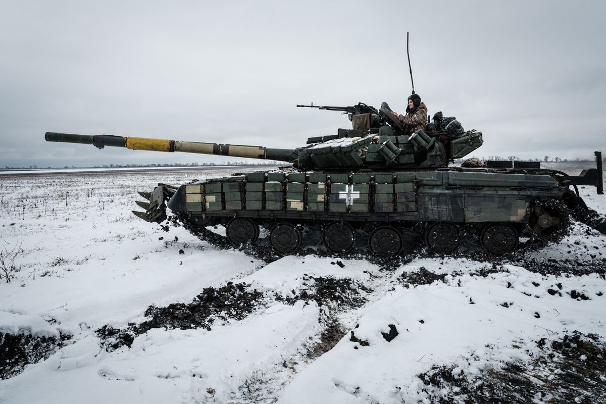 Ukrainian serviceman of the first tank brigade Igor, 26, who has worked as a gunner for four years, rides on the T-64 Main Battle Tank near the frontline in the Donetsk region on February 4, 2023, amid the Russian invasion of Ukraine. 