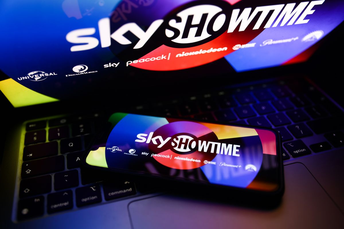 SkyShowtime website displayed on phone and laptop screens are seen in this illustration photo taken in Krakow, Poland on January 30, 2023. 