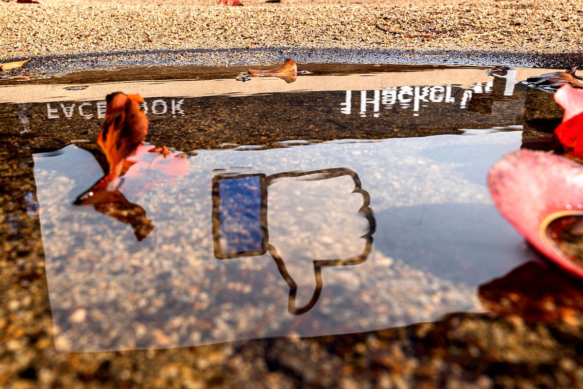 Facebook Headquarters As Company Plans To Rebrand With New Name
The Facebook logo reflected in a puddle at the company's headquarters in Menlo Park, California, U.S., on Monday, Oct. 25, 2021. Facebook Inc., facing intense scrutiny over its business practices, is planning to rebrand the company with a new name that focuses on the metaverse, according to The Verge. Photographer: David Paul Morris/Bloomberg via Getty Images