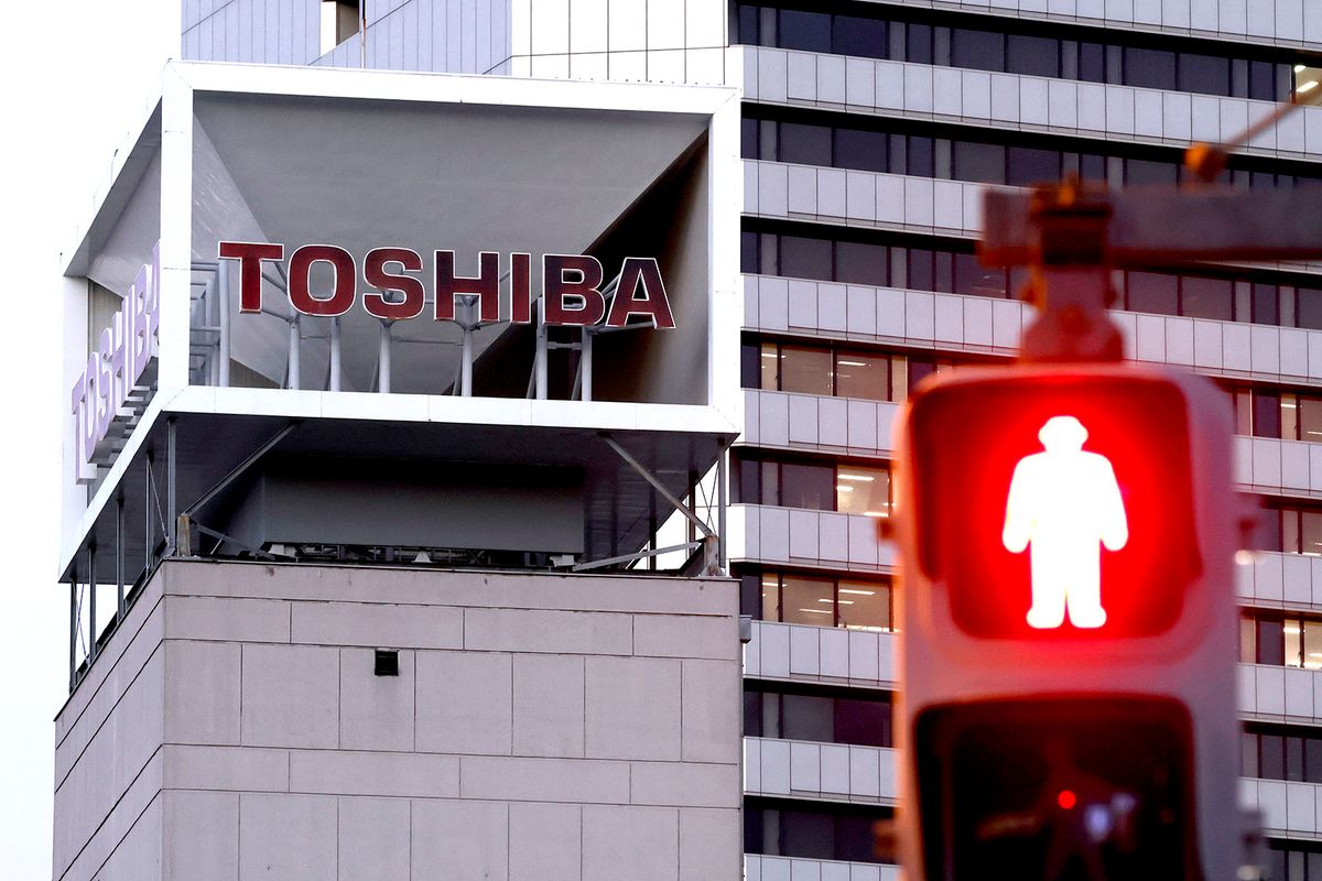 Toshiba Headquarters As Prospective Buyer Mulls Reducing Bid
Signage for Toshiba Corp. displayed at the company's headquarters in Tokyo, Japan, on Monday, Dec. 19, 2022. Toshiba's shares dropped on a report that the company's preferred bidder may lower its valuation. The iconic Japanese conglomerate has been exploring options for its future including going private. Photographer: Kiyoshi Ota/Bloomberg via Getty Images