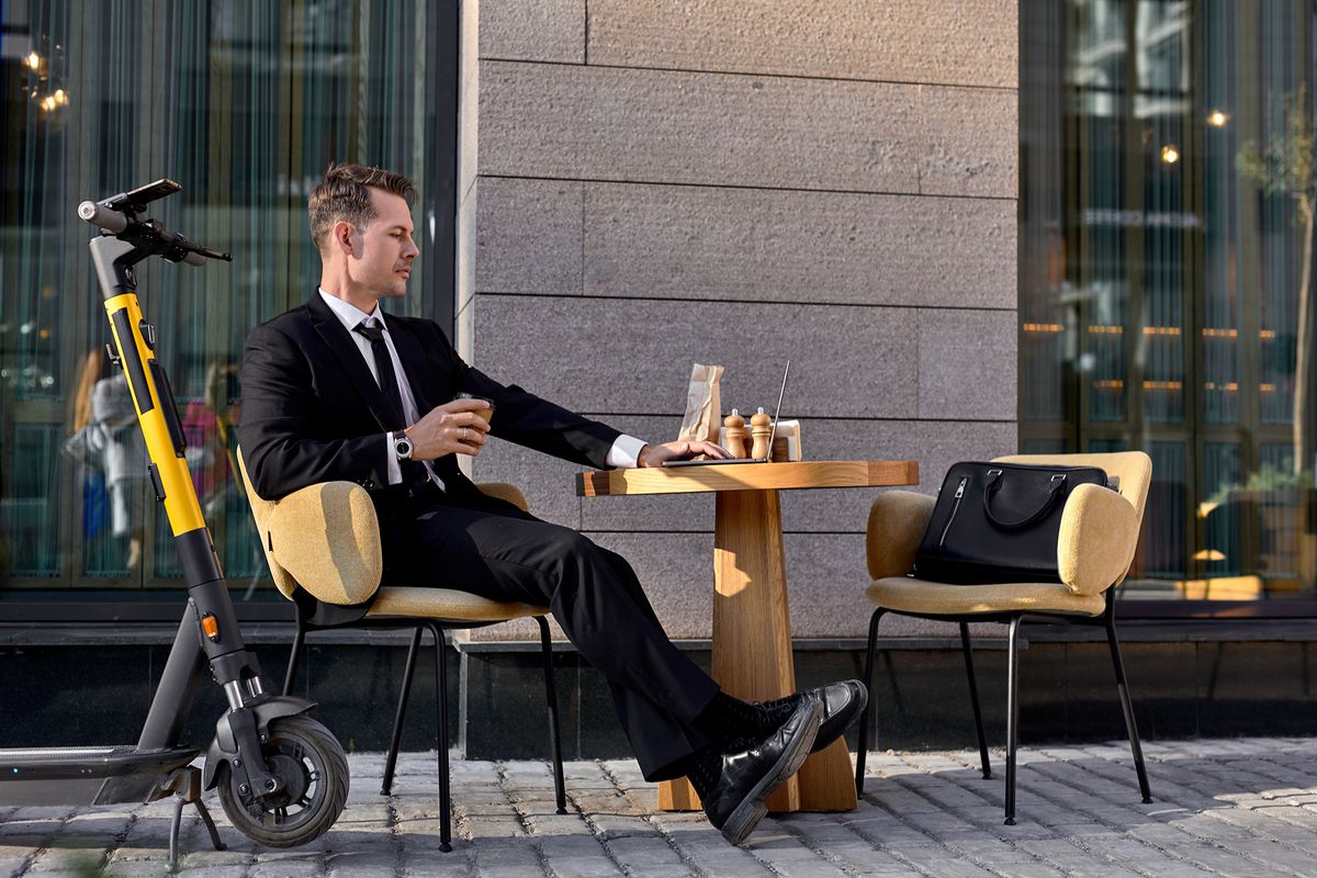 Guy,In,Formal,Stylish,Suit,Sit,In,Outdoor,Cafe,Working