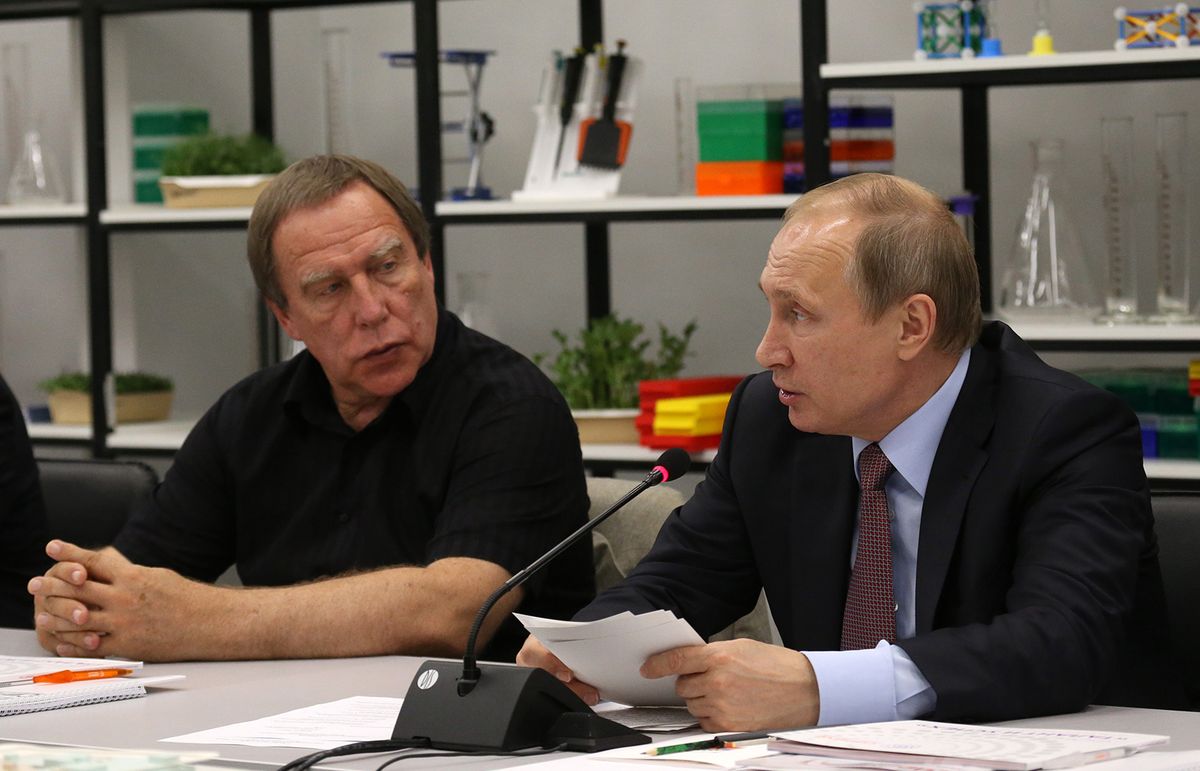 Vladimir Putin Visits Sochi
SOCHI, RUSSIA - JULY 19: (RUSSIA OUT) Russian President Vladimir Putin (R) talks as cellist and businessman Sergei Roldugin (R) looks on during the meeting of the Board of trustees of the Sirius education center for gifted children on July 19, 2016 in Sochi, Russia. Vladimir Putin said the latest report on doping among Russian athletes lacked substance and was highly political. The Russian president said officials named in the report will be temporarily suspended. (Photo by Mikhail Svetlov/Getty Images)
