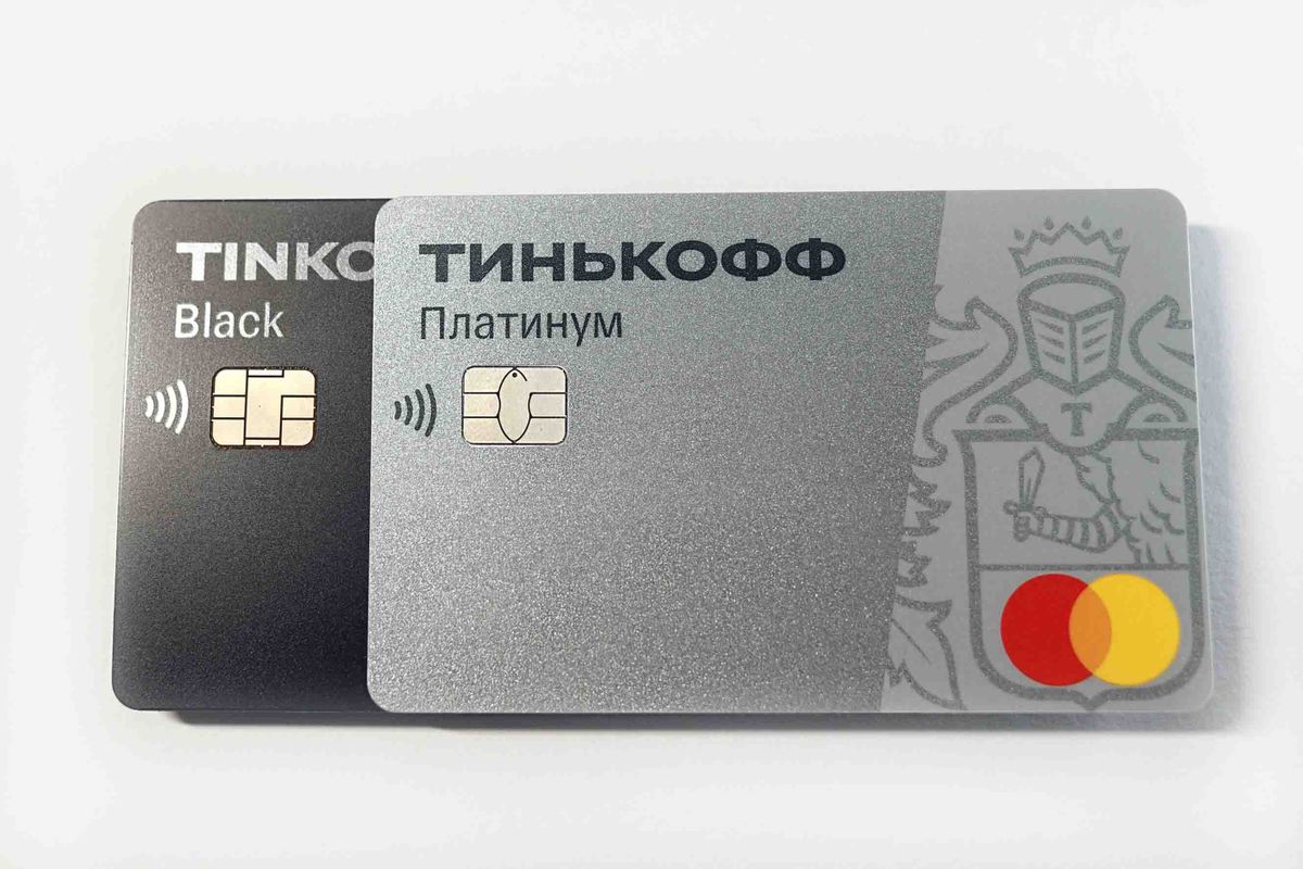 Moscow, Russia - 11.12.22: Tinkoff Bank cards. Tinkoff Bank is a Russian commercial bank based in Moscow and founded by Oleg Tinkov, the world's largest digital bank. Ð¡hip with antenna (RFID tag).