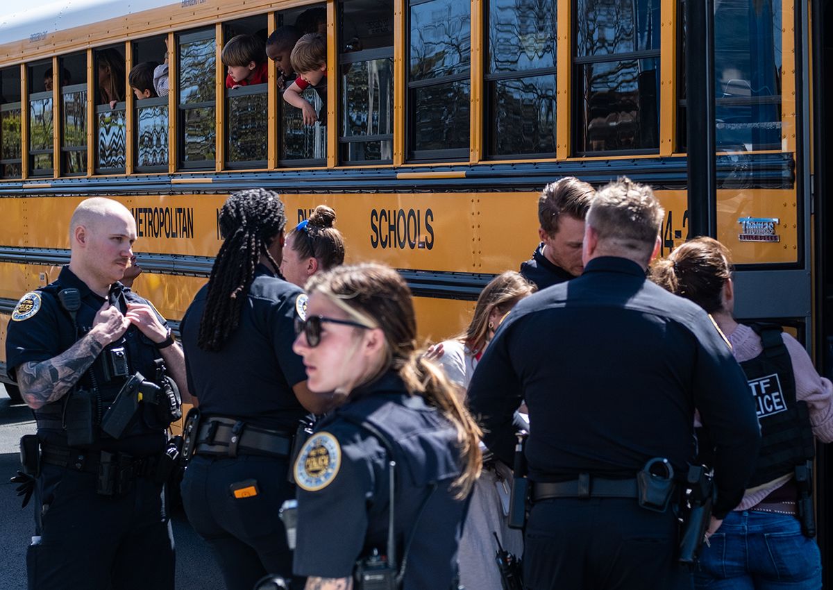 Six Killed In Mass Shooting At A Private School In Nashville
NASHVILLE, TN - MARCH 27: School buses with children arrive at Woodmont Baptist Church to be reunited with their families after a mass shooting at The Covenant School on March 27, 2023 in Nashville, Tennessee. According to initial reports, three students and three adults were killed by the shooter, a 28-year-old woman. The shooter was killed by police responding to the scene. (Photo by Seth Herald/Getty Images)