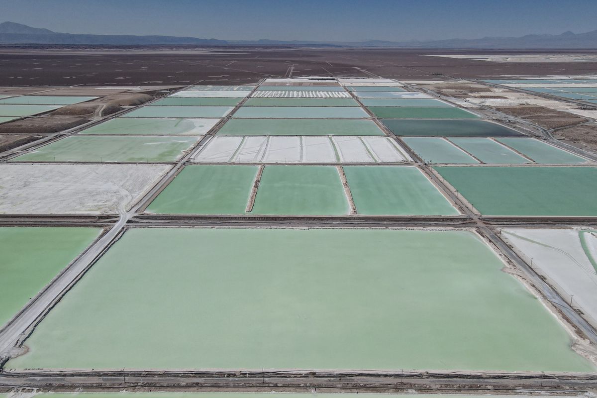 SALAR DE ATACAMA, CHILE - OCTOBER 25: Huge pools of brine containing lithium carbonate and mounds of salt by-products stretch across a lithium mine in the Atacama Desert in Salar de Atacama, Chili on October 25, 2022. The Chemical and Mining Society of Chile (SQM) is expanding its mining operations in Salar de Atacama to meet the growing global demand for lithium carbonate, the main ingredient in battery production for electric vehicles. Chile is the world's second largest producer of lithium after Australia. 