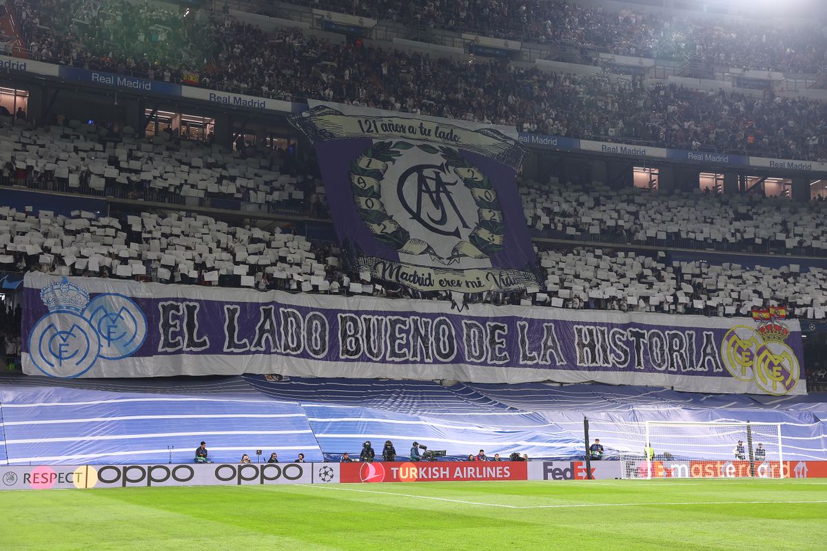MADRID, SPAIN - MARCH 15: Real Madrid fans display a giant banner ahead of the UEFA Champions League round of 16 leg two match between Real Madrid and Liverpool FC at Estadio Santiago Bernabeu on March 15, 2023 in Madrid, Spain. (Photo by Chris Brunskill/Fantasista/Getty Images)