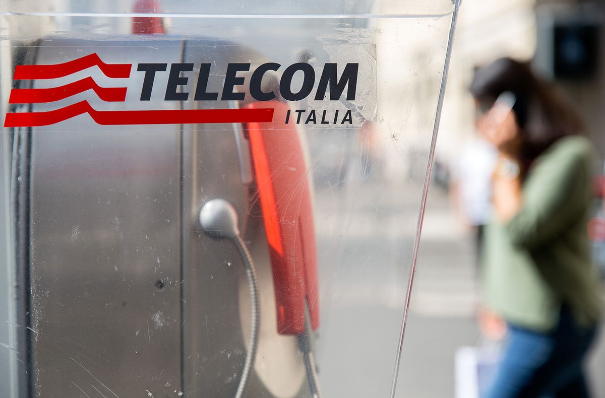 Telecom Italia SpA Stores And Fixed-Line Phones As Company Is Said To Weigh New Changes to ManagementA logo sits on a fixed-line public telephone booth, operated byTelecom Italia SpA, in Rome, Italy, on Monday Sept. 25, 2017. Telecom Italia is considering another management shuffle that may see an Italian returning to a senior role at the countrys biggest phone carrier in a bid to head off punitive action by regulators in the country, people familiar with the matter said. Photographer: Alessia Pierdomenico/Bloomberg via Getty Images