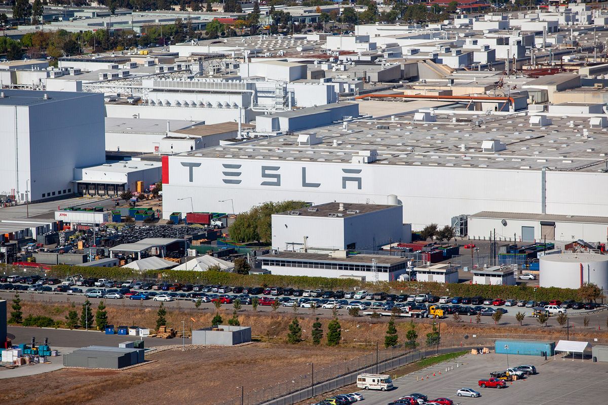 Aerial Views Of Silicon Valley Housing And Tech Campuses
The Tesla Inc. assembly plant stands in this aerial photograph taken above Fremont, California, U.S., on Wednesday, Oct. 23, 2019. Tesla shares are trading above Wall Street expectations after spending most of the year languishing below analysts' average price targets. Photographer: Sam Hall/Bloomberg via Getty Images