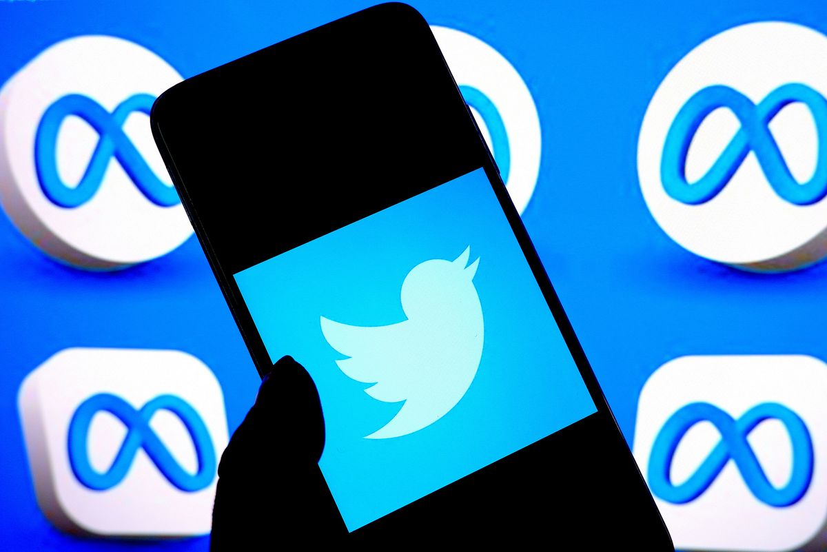 In this photo illustration, a Twitter logo is displayed on a